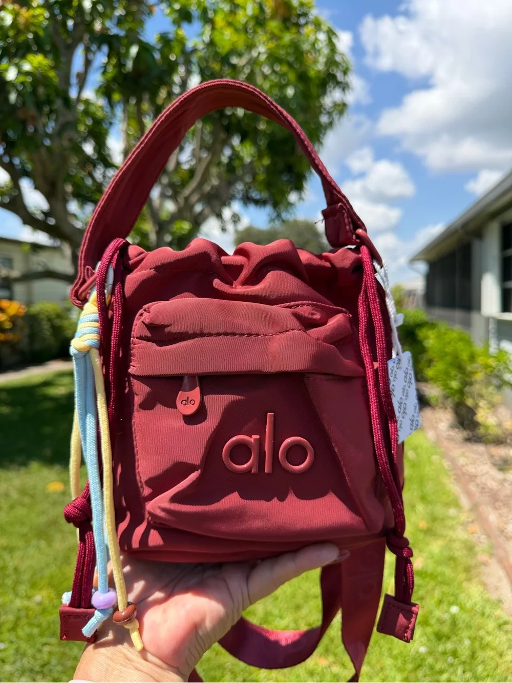 ALO Yoga Burgundy  Drawstring Mini Bucket Bag with Multicolor Cord Tassels